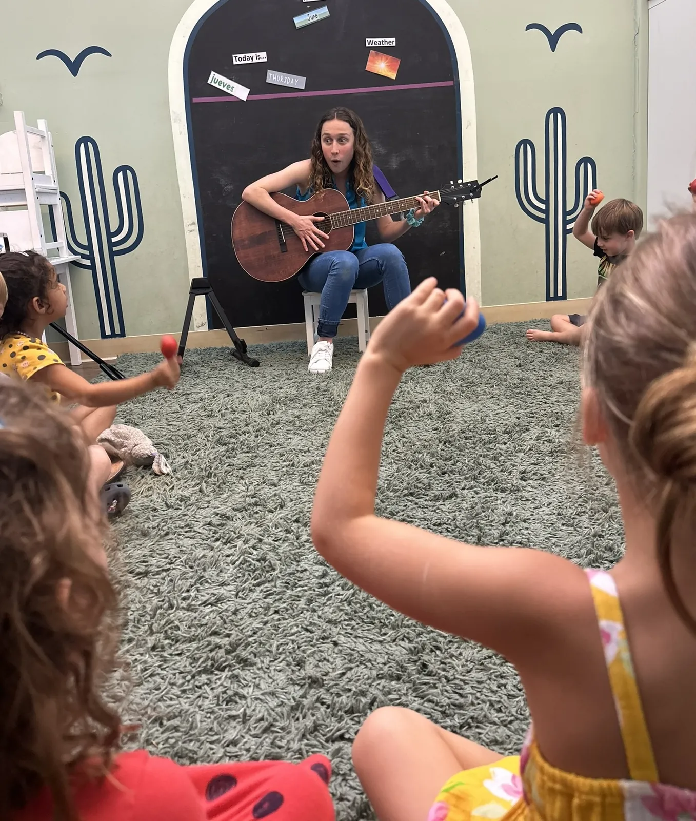 Amber leading a music class at Green Sprout